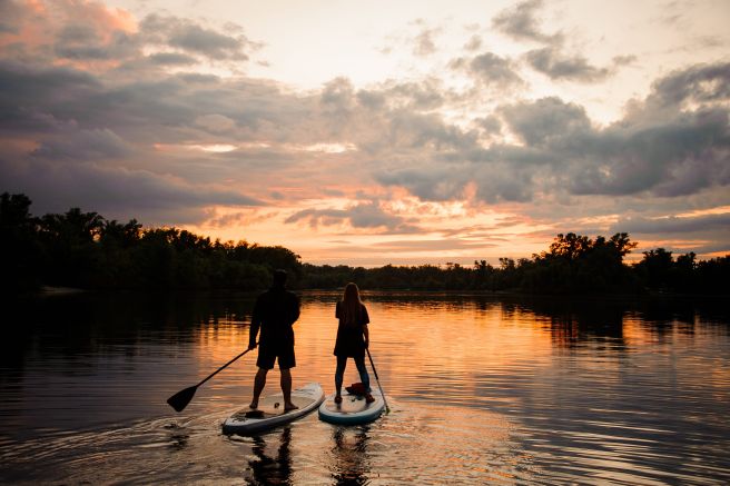 Paddle boarding at sunset